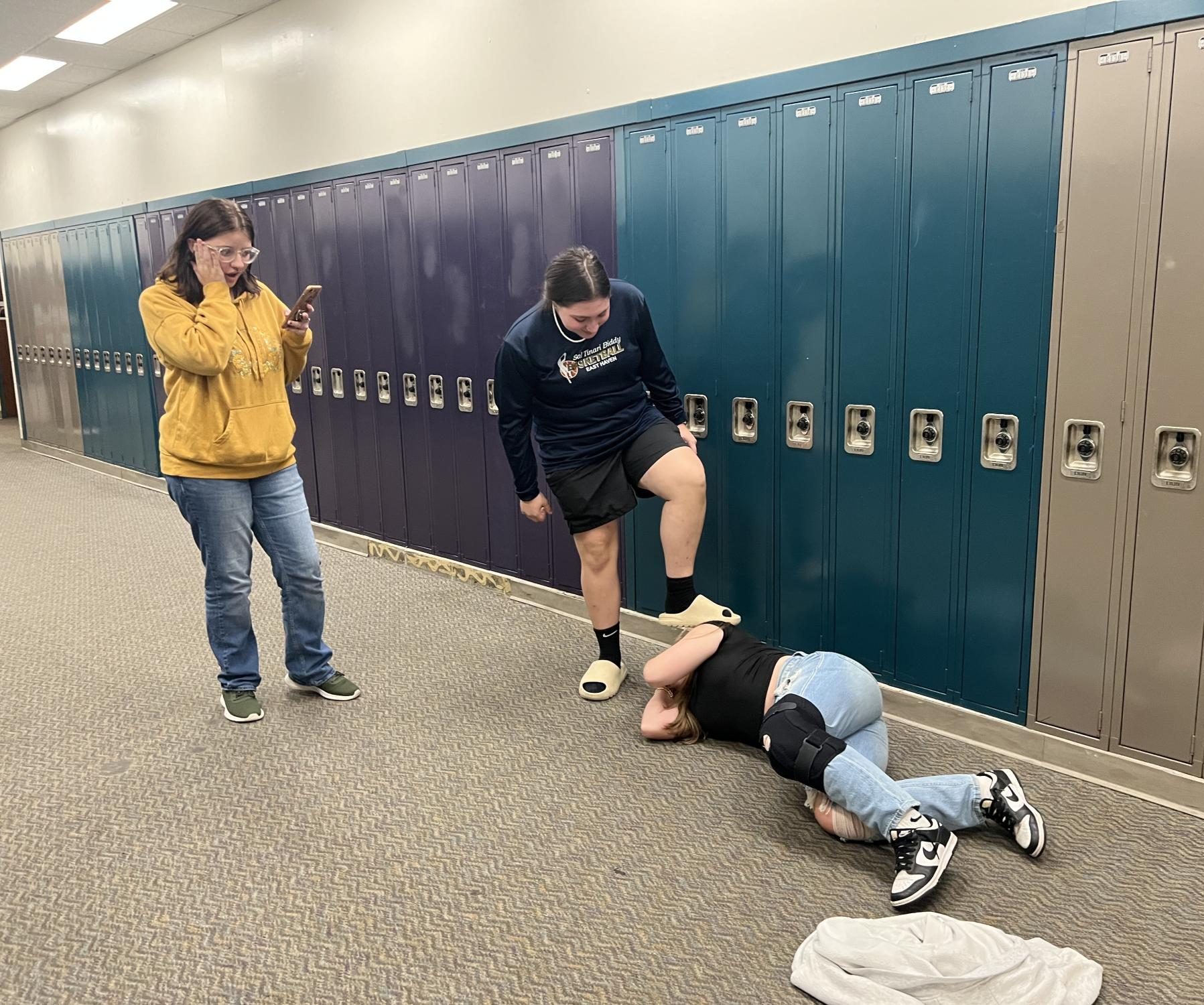 Staged Fight between Comet Reporters Stella and Rachel with Comet Reporter Destiny recording.